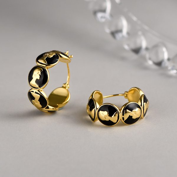 Retro Silver Socialite Light Luxury Minority Metal Queen Head Earrings